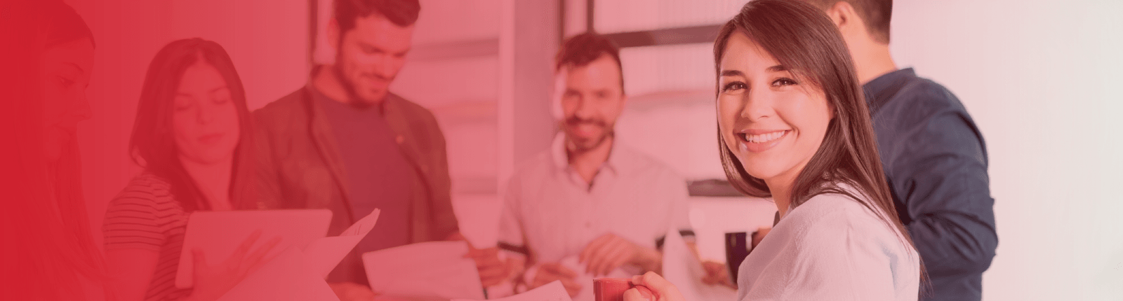 business woman smiling during an office meeting