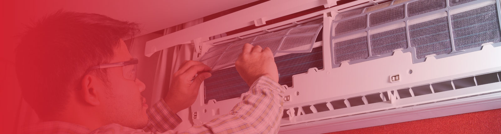 employee working on AC unit