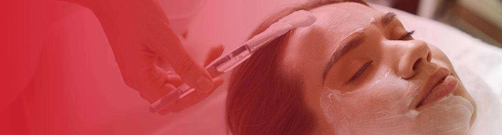 woman receiving facial treatment