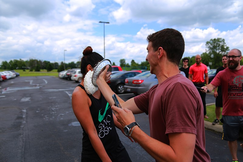 RevLocal employee getting pied in the face